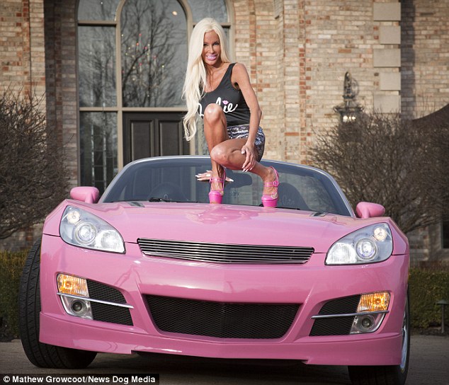 Her husband, David, has created her to three customised Barbie cars - including a pink Porsche - at a cost of $247,000