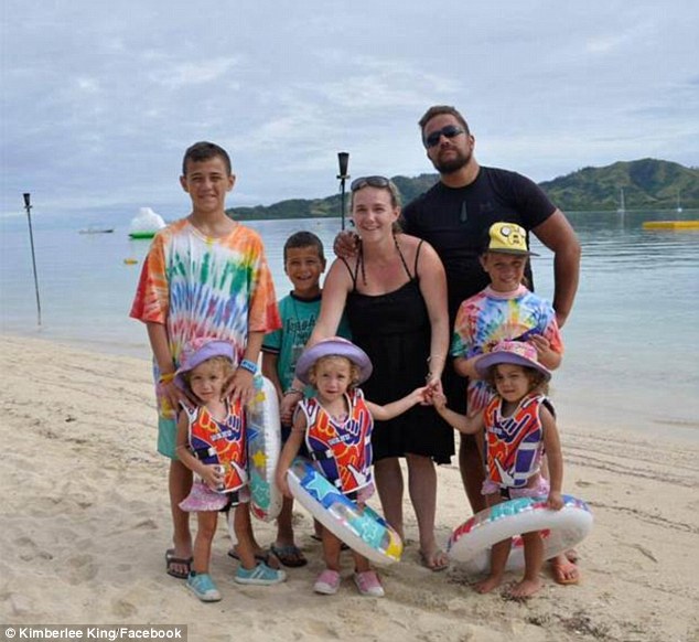 Mrs King with her husband Takahi and children (at back from left) Tane, 12, Taison,  seven and Makaya, 10 and at front, triplets Mackenna, Madisyn and Mariyah, all four